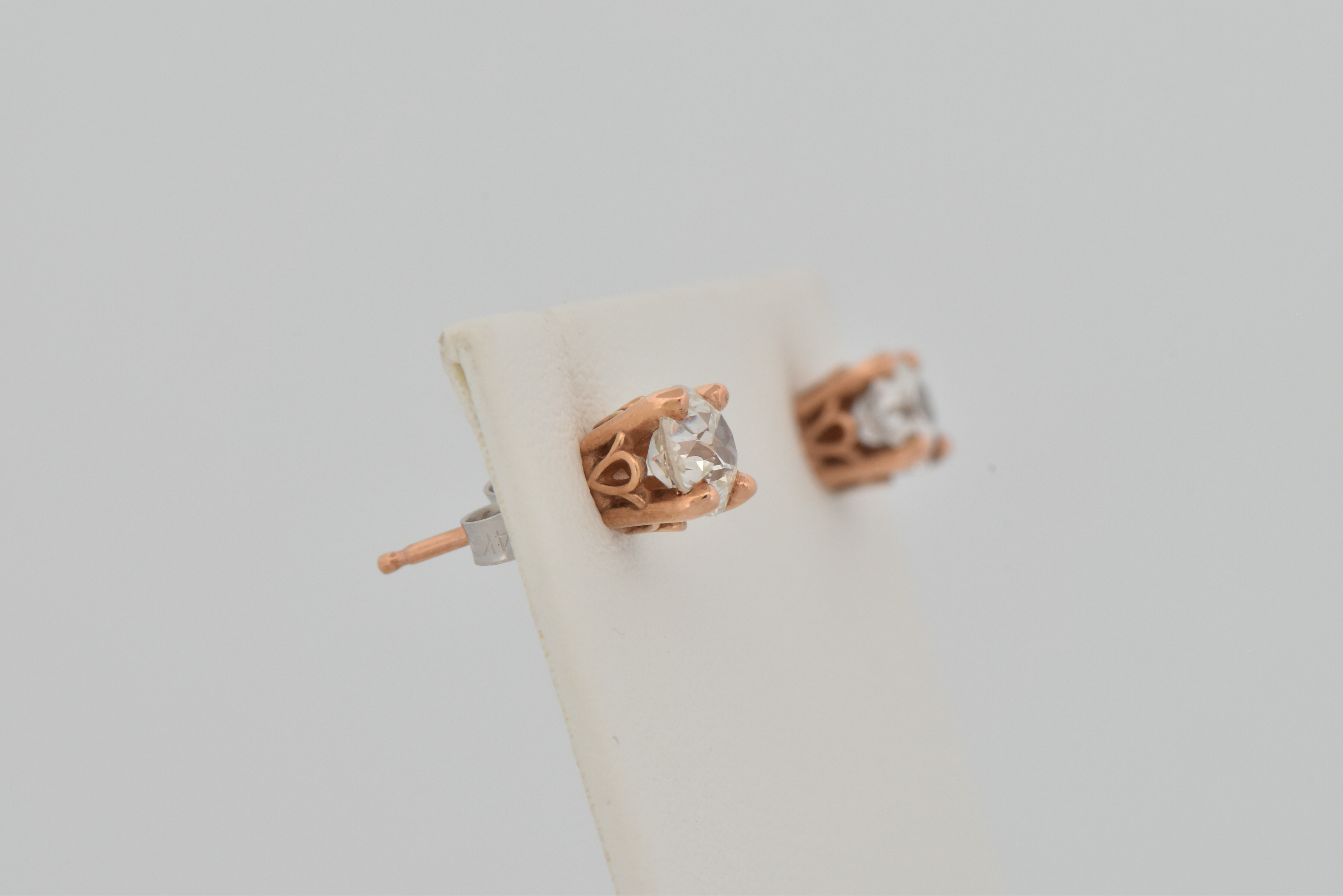 14K Rose Gold Diamond Earrings with a .47 Carat Old Cut Diamond, SI1-2 Quality, E-F Color. and a .48 Carat Old Cut Round Diamond, SI2 Quality, K Color "COE"