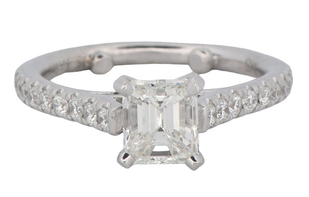 14K White Gold Estate Diamond Engagement Ring with a 1.00 Carat Emerald Cut Diamond, SI1 Clarity, H Color, GIA # 2195059741 with .27 Carat Total Weight in Round Cut Diamonds.
