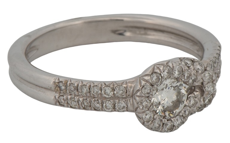 14K White Gold Diamond Ring with an Approximate .20 Carat Round Brilliant, SI2 Clarity, H Color and Approximately .70 Carat Total Weight in Brilliant Cut Round Side Diamonds, SI Clarity, H-I Color,