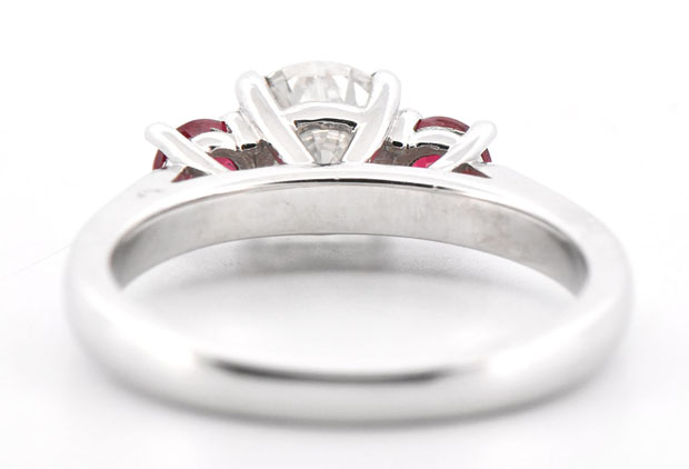 14K White Gold Diamond Ring with a 1.01 Carat Round Brilliant, VS2 Clarity, H Color GIA #5212054622 and .65 Carat Total Weight in Two Round Rubies, AAA Quality