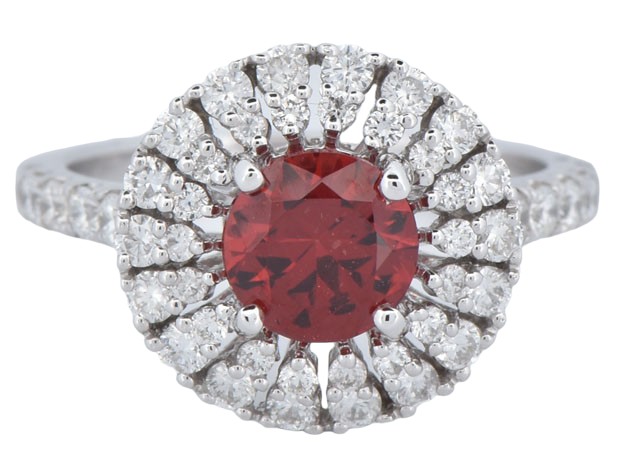 14K White Gold Diamond Ring with a 1.24 Carat Round Orangey Red Garnet Center Stone and Approximately .90 Carat Total Weight in Round Cut Side Diamonds. Finger Size 6.