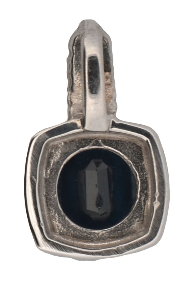 14K White Gold Sapphire and Diamond Pendant with a .82 Carat Sapphire and .05 Carat Total Weight in Round Cut Diamonds.