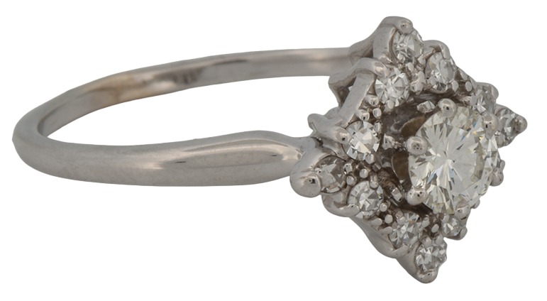 18K White Gold Estate Diamond Ring with an Approximate .40 Carat Round Brilliant Center and Approximately .25 Carat Total Weight in Round Side Diamonds, SI1 Clarity, H-I Color. Finger Size 7.75.