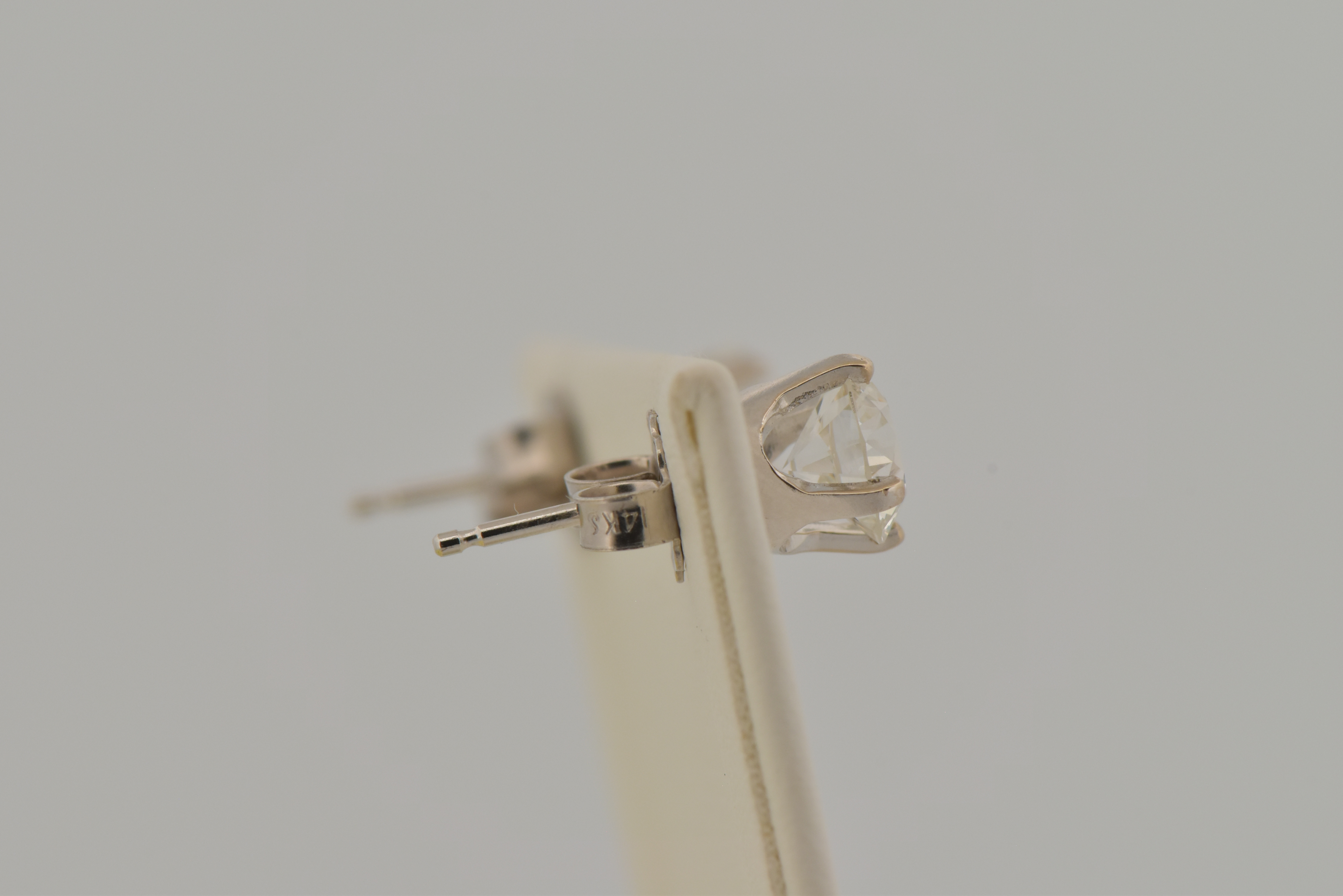 14K White Gold Diamond Stud Earrings with a .68 Carat Round Brilliant Diamond, VVS2 Clarity, G Color GIA #6223575732 and .76 Carat Round Brilliant, VVS1 Clarity, H Color GIA #2223670320