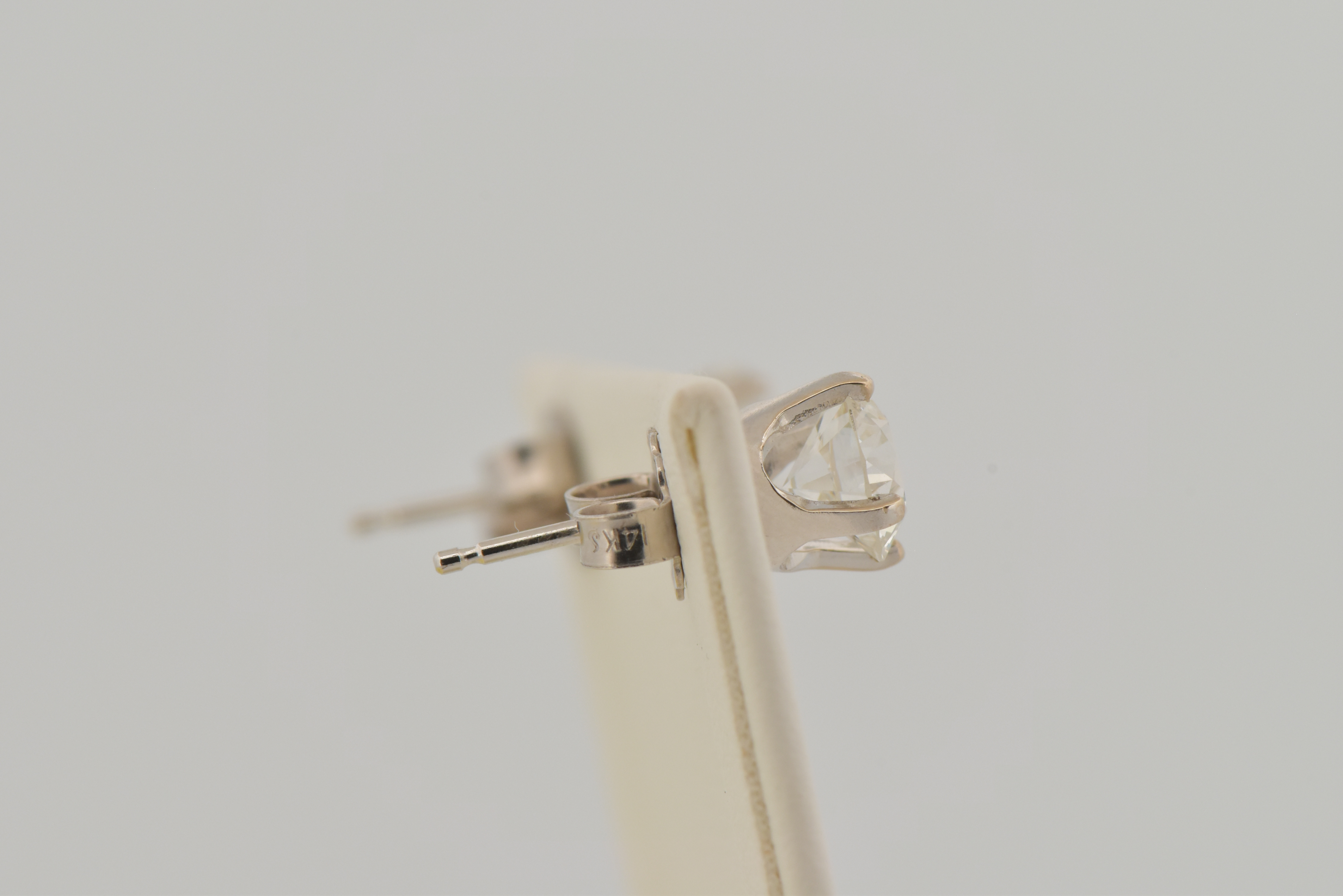 14K White Gold Diamond Stud Earrings with a .68 Carat Round Brilliant Diamond, VVS2 Clarity, G Color GIA #6223575732 and .76 Carat Round Brilliant, VVS1 Clarity, H Color GIA #2223670320