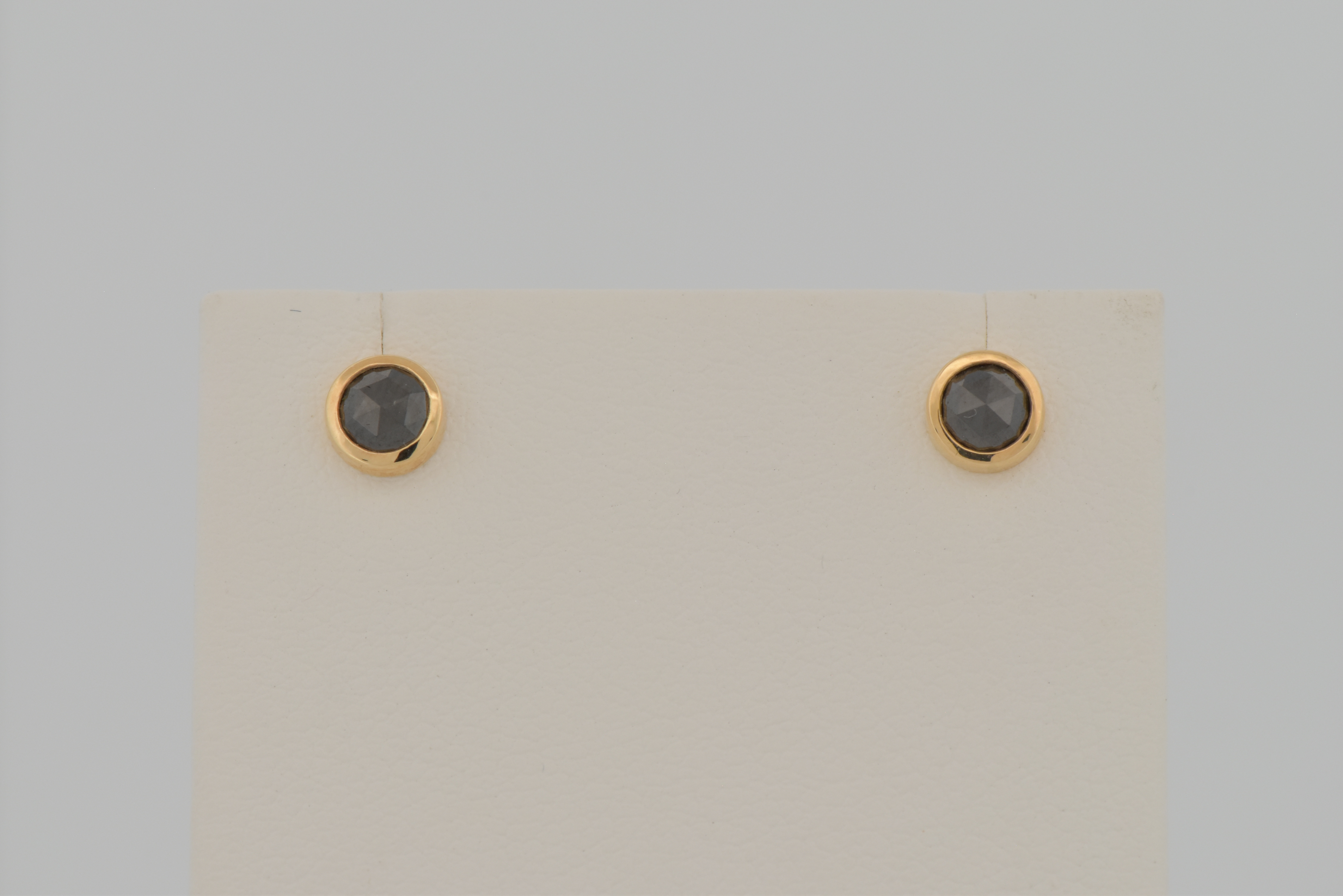 14K Yellow Gold Black Rose-Cut Diamond Studs with .50 Carat Total Weight.