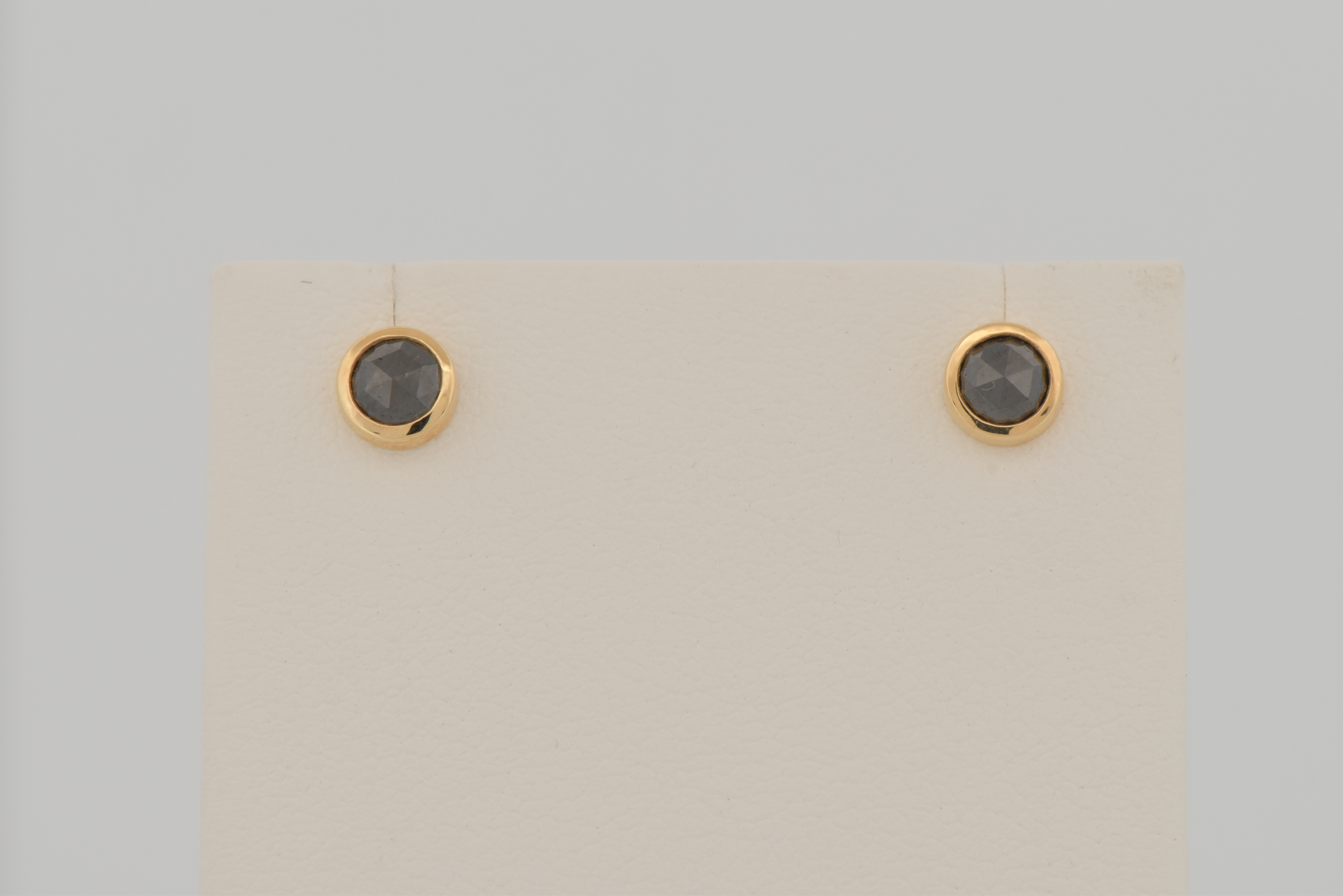 14K Yellow Gold Black Rose-Cut Diamond Studs with .50 Carat Total Weight.