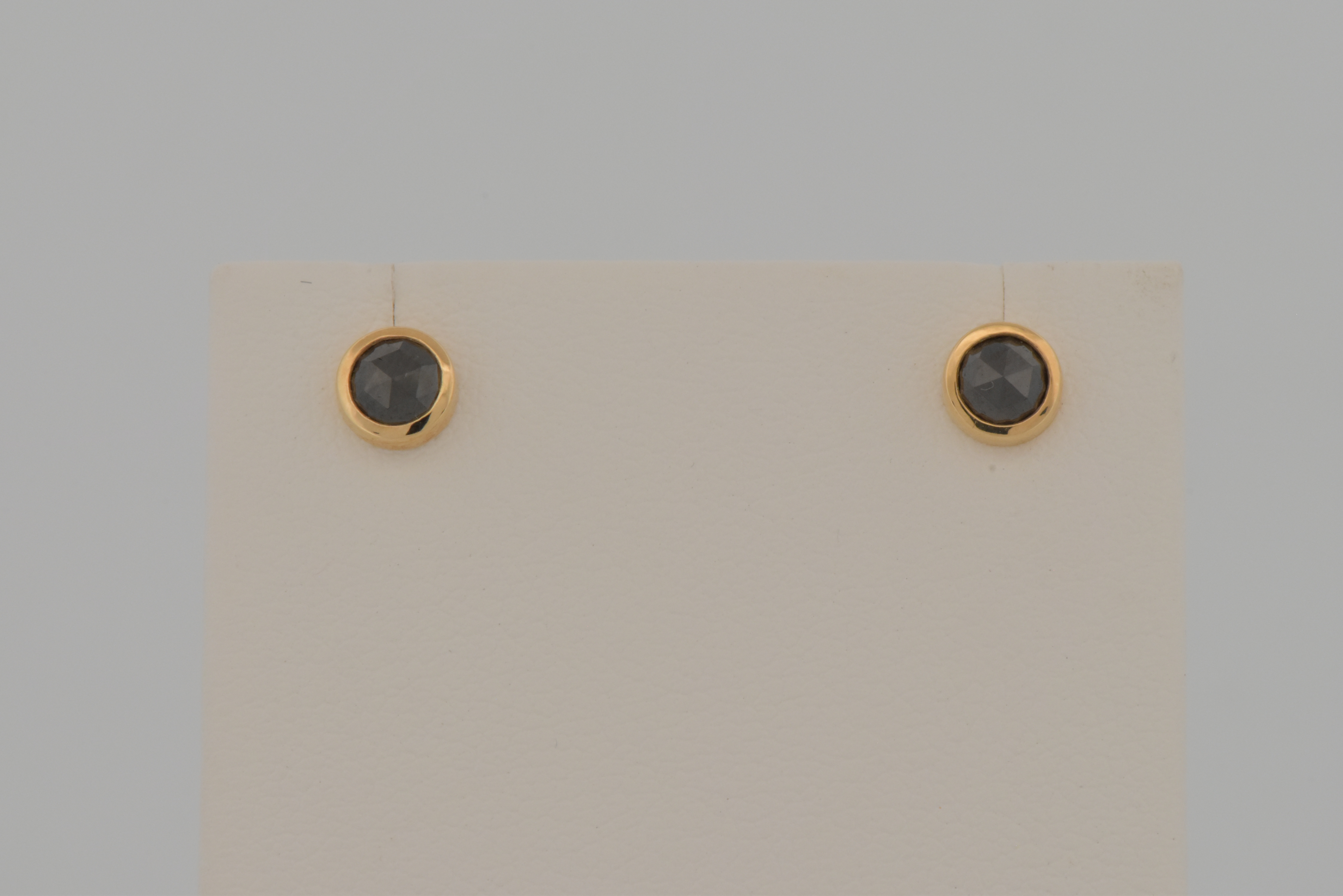 14K Yellow Gold Black Rose-Cut Diamond Studs with .50 Carat Total Weight.