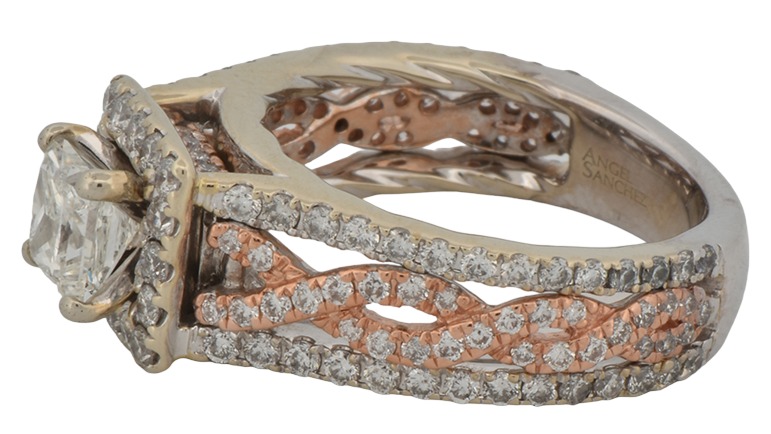 14K Two-Tone Estate Diamond Engagement Ring with a .67 Carat Princess Cut Center Diamond, I1 Clarity, I Color and Approximately .85 Carat Total Weight in Round Cut Side Diamonds, SI Clarity, I Color.