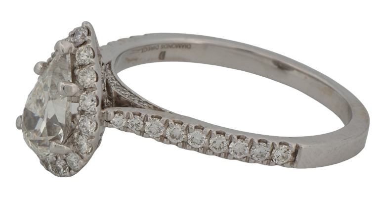 14K White Gold Diamond Ring with a .85 Carat Pear Diamond, SI1 Clarity, G Color and Approximately .50 Carat Total Weight in Side Diamonds