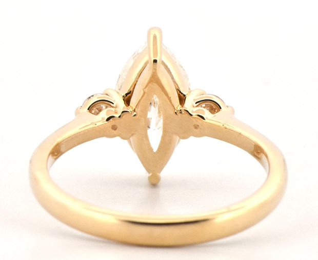 14K Yellow Gold Diamond Ring with a 2.04 Carat Marquise Brilliant Center Cut Diamond, I2 Clarity, I Color GIA #2225784449 and .20 Carat Total Weight in Round Cut Side Diamonds, SI1, H. Finger Size 7.