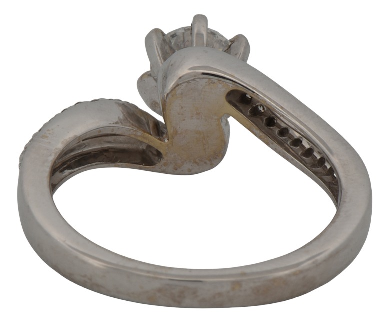 14K White Gold Estate Diamond Ring with a .70 Carat Brilliant Round Diamond, I1 Clarity, F-G Color with Approximately .15 Carat Total Weight in Round Cut Diamonds.