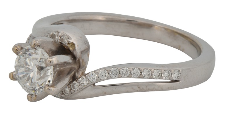 14K White Gold Estate Diamond Ring with a .70 Carat Brilliant Round Diamond, I1 Clarity, F-G Color with Approximately .15 Carat Total Weight in Round Cut Diamonds.