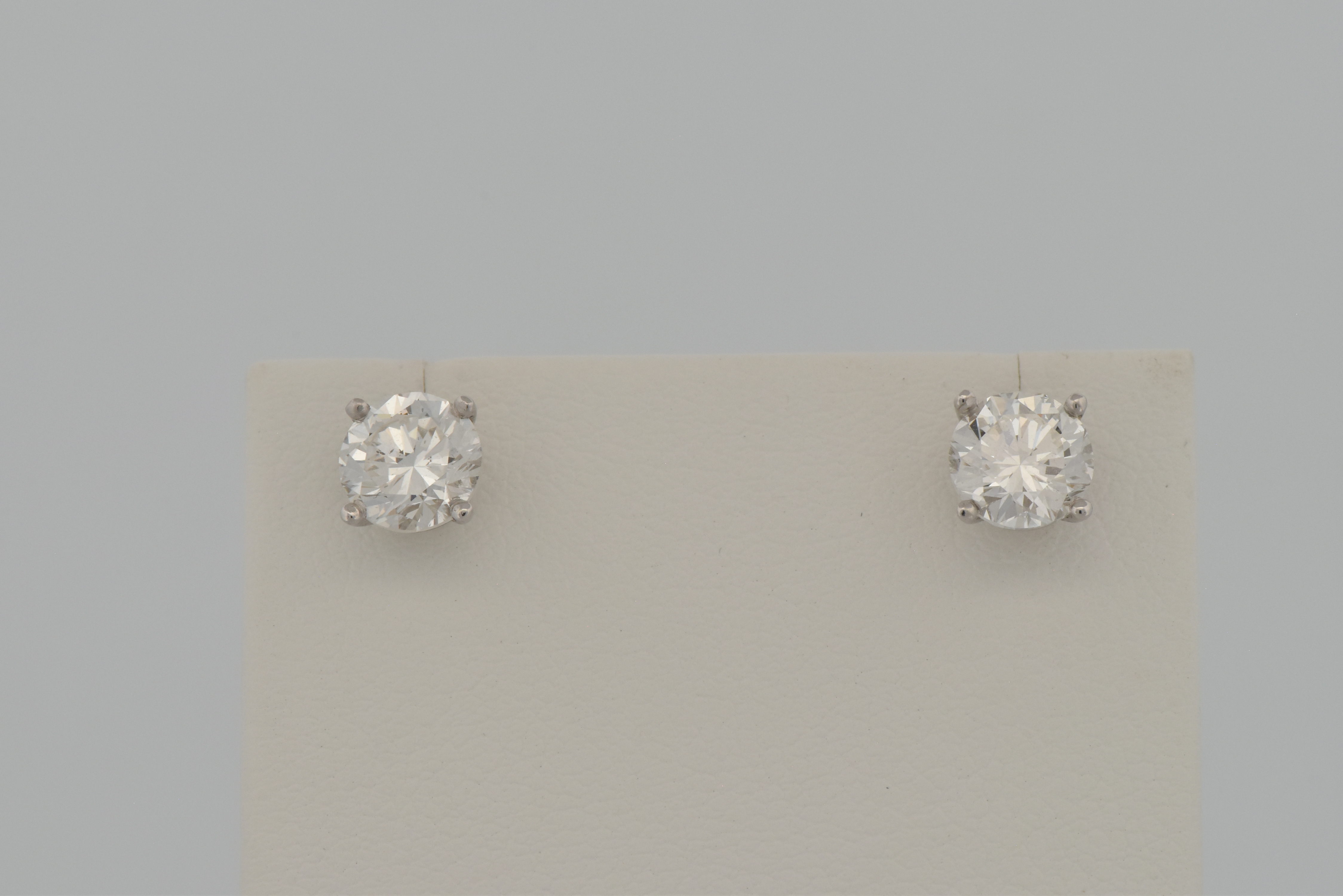 14K White Gold Diamond Stud Earrings with a 1.01 Carat Round Brilliant, VS2 Clarity, F Color GIA #2221696726 and a 1.01 Carat Round Brilliant, VS2 Clarity, F Color GIA #2161579221