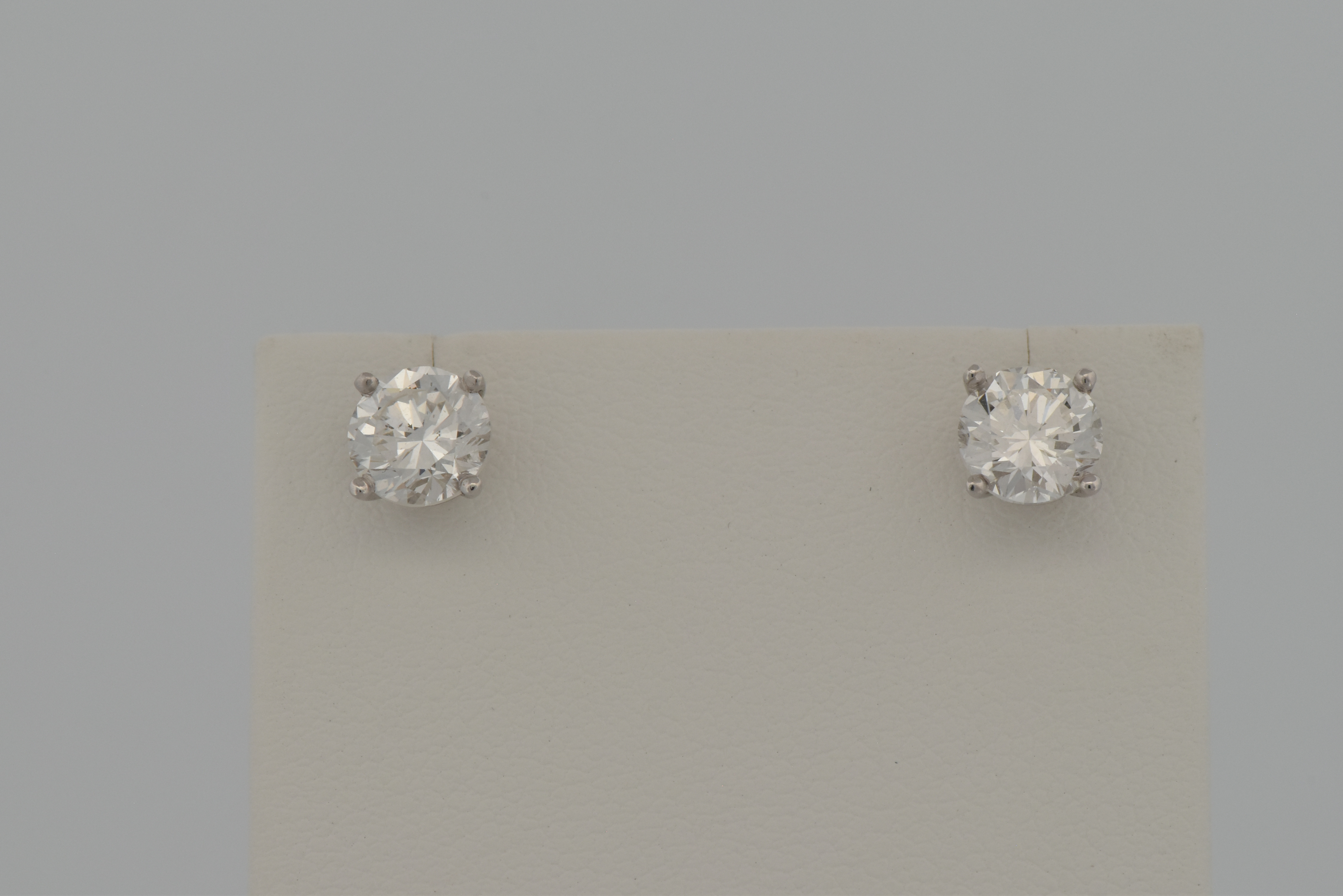 14K White Gold Diamond Stud Earrings with a 1.01 Carat Round Brilliant, VS2 Clarity, F Color GIA #2221696726 and a 1.01 Carat Round Brilliant, VS2 Clarity, F Color GIA #2161579221