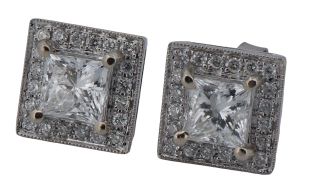 14K White Gold Diamond Earrings with Approximately 1.00 Carat Total Weight in Princess Cut Center Diamonds, I1 Clarity, H Color and Approximately .40 Carat Total Weight in Round Side Diamonds