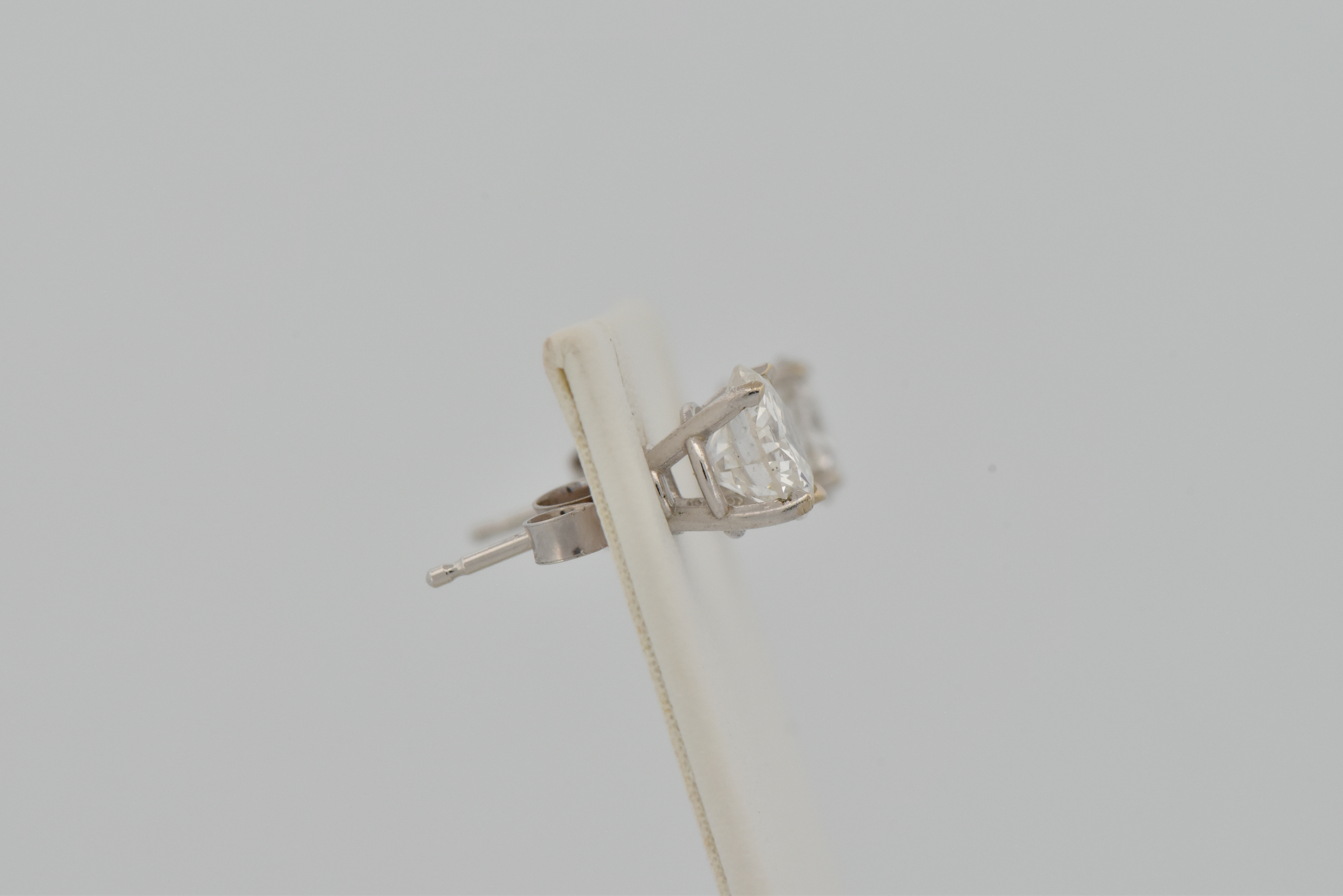 14K Diamond Stud Earrings with a .93 Carat Round Brilliant, I1 Clarity, F Color GIA #5222646123 and a .94 Carat Round Brilliant, I1 Clarity, G Color GIA #2225470606
