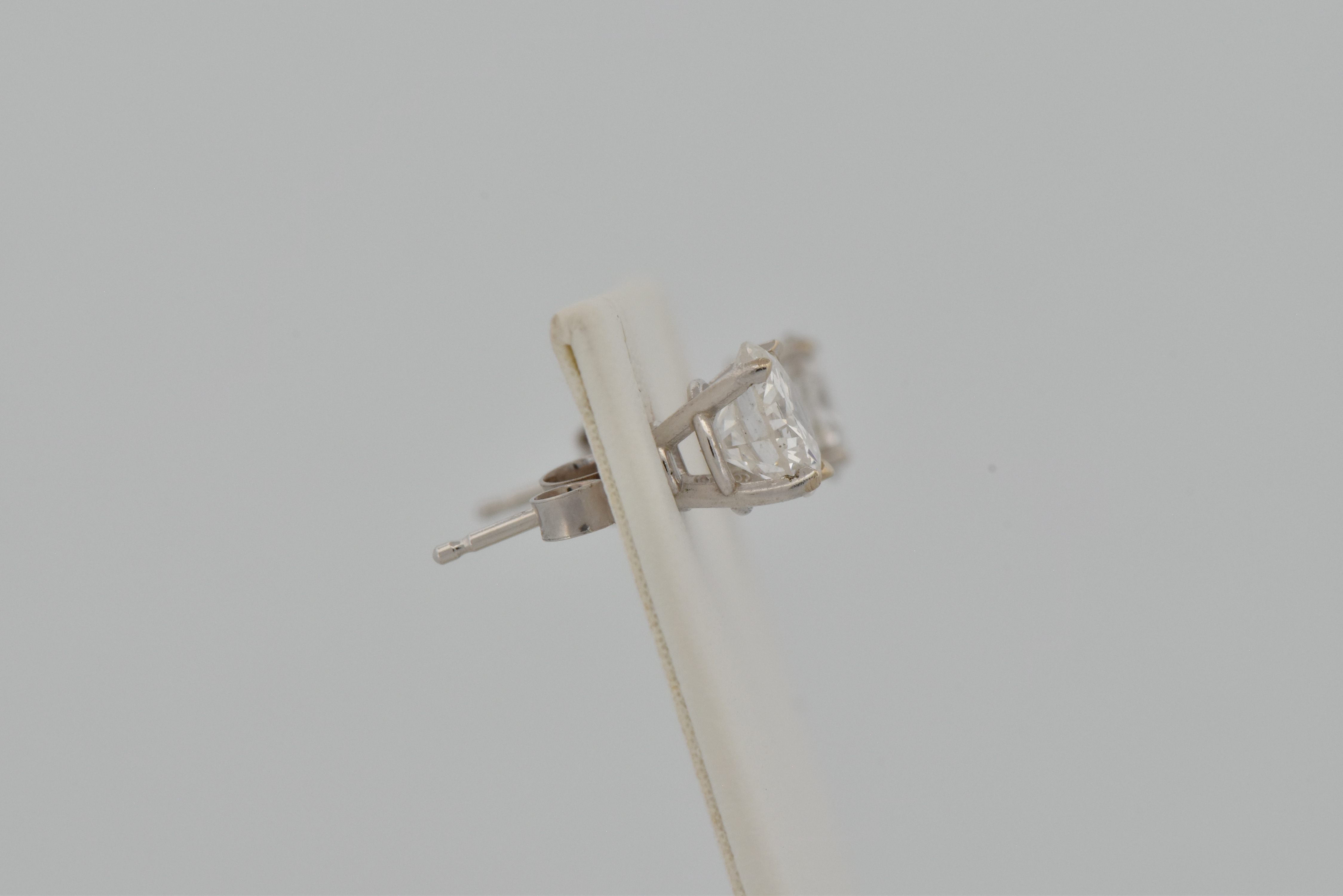 14K Diamond Stud Earrings with a .93 Carat Round Brilliant, I1 Clarity, F Color GIA #5222646123 and a .94 Carat Round Brilliant, I1 Clarity, G Color GIA #2225470606