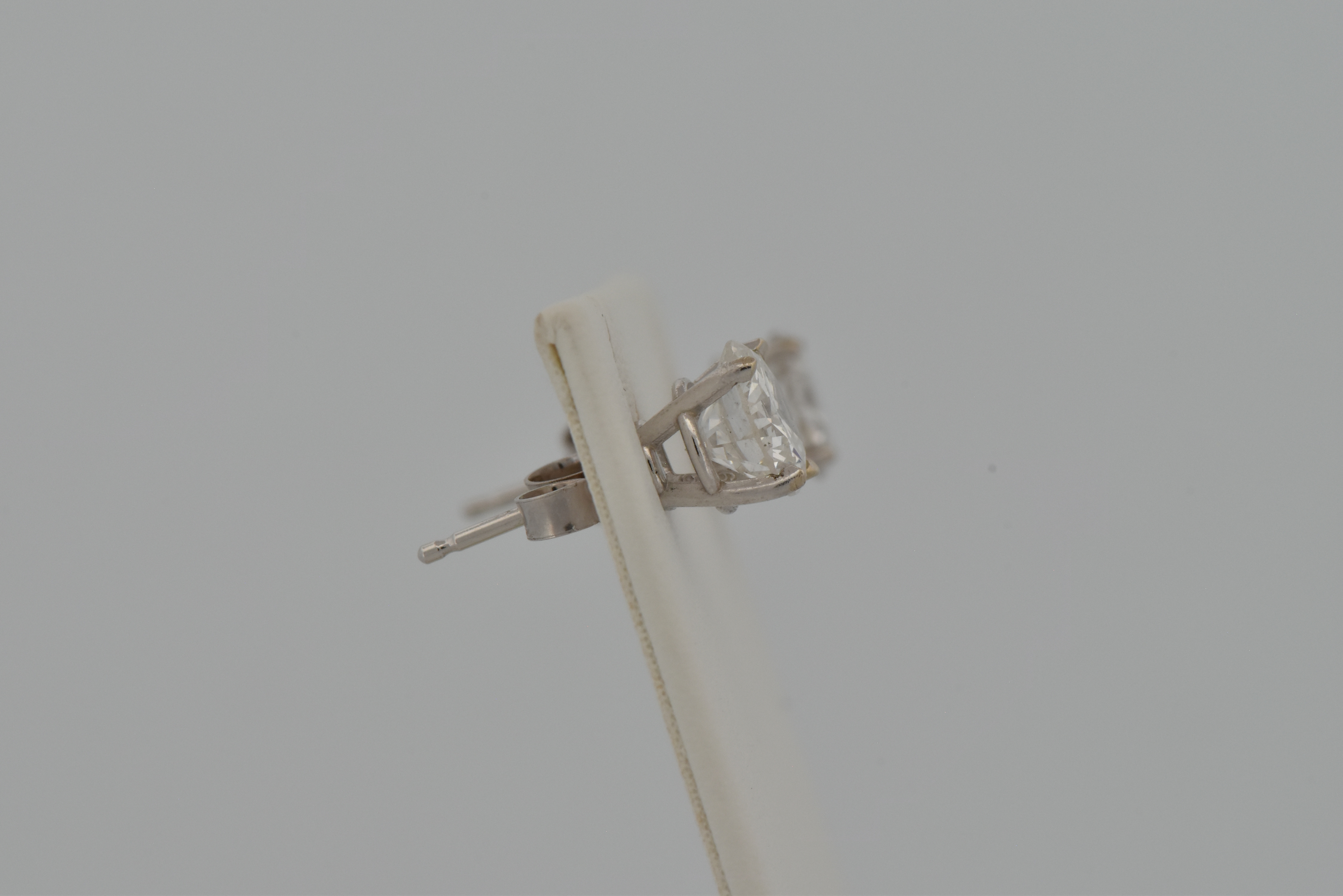 14K Diamond Stud Earrings with a .93 Carat Round Brilliant, I1 Clarity, F Color GIA #5222646123 and a .94 Carat Round Brilliant, I1 Clarity, G Color GIA #2225470606