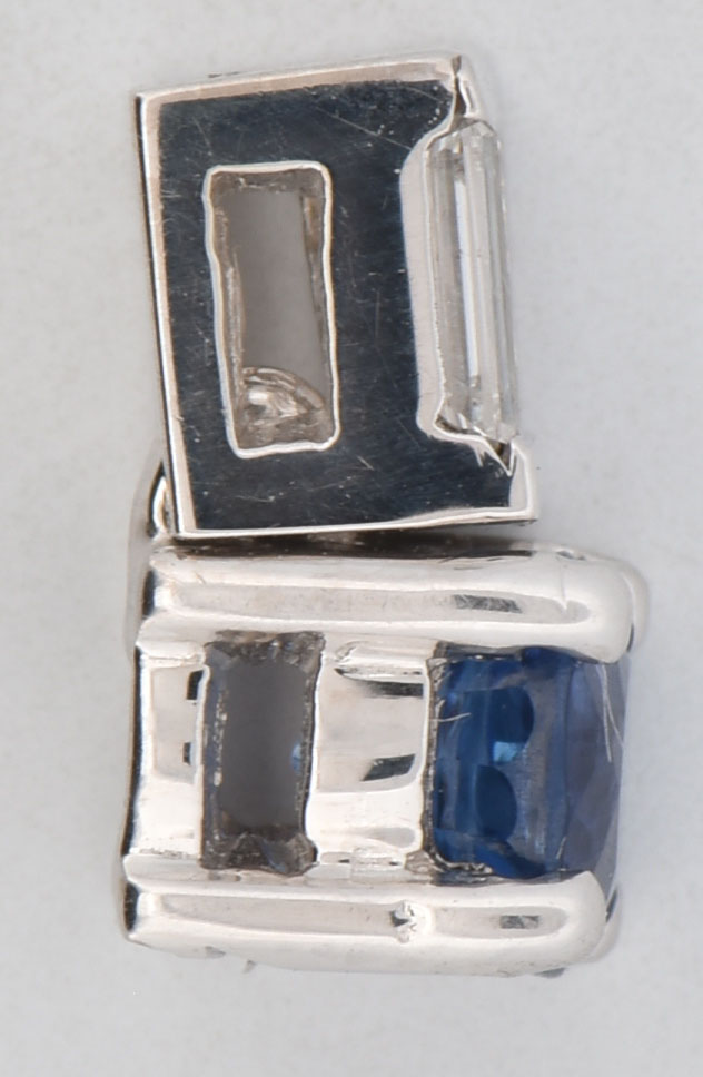 14K White Gold Pendant with an Approximate .50 Carat Round Violetish Blue Sapphire and Approximately .15 Carat Total Weight in Baguette Diamonds, VS Clarity, H Color