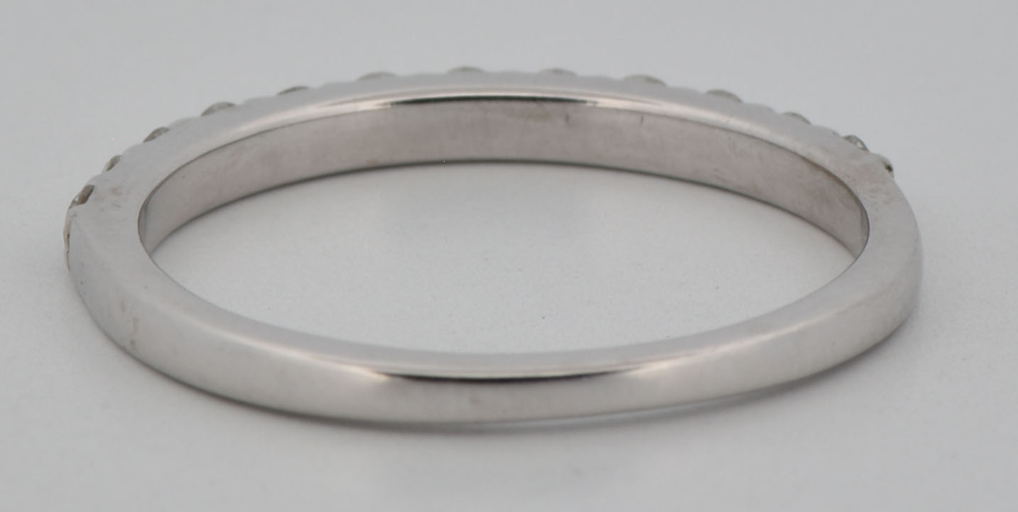 14K White Gold Estate Diamond Band with Approximately .35 Carat Total Weight in Round Cut Diamonds, SI1-2 Clarity, H-I Color. Finger Size 6.25.
