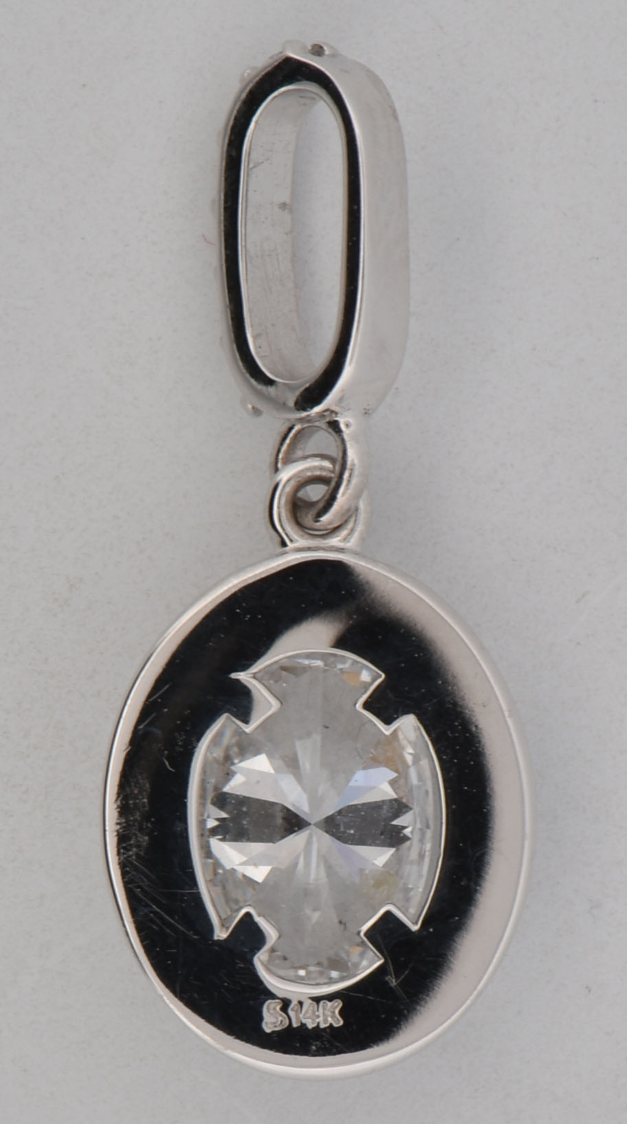 14K White Gold Diamond Pendant with a .92 Carat Oval Diamond, Si2 Clarity, G Color and .30 Carat Total