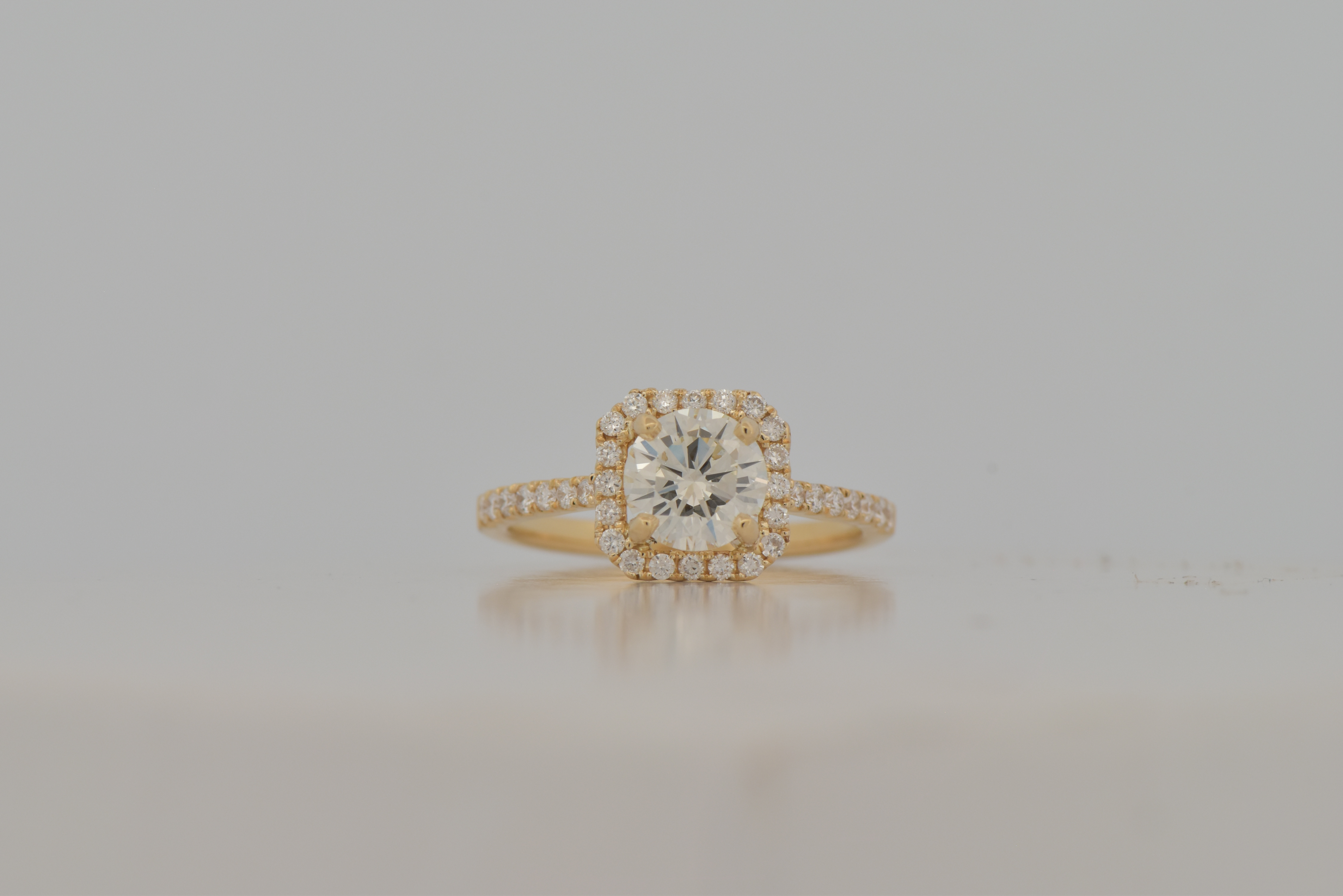14K Yellow Gold Diamond Engagement Ring with a 1.04 Carat Round Brilliant Diamond, VS1 Clarity, I Color, GIA # 6234205927 with .35 Carat Total Weight in Round Side Diamonds, SI1 Clarity, G-H Color.