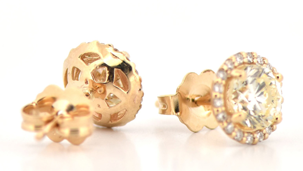 14K Yellow Gold Diamond Earrings with a .69 Carat Round Brilliant, I1 Clarity, Q-R Color GIA 6233859718 and a .73 Carat Round Brilliant, SI1 Clarity, Q-R Color GIA 6233859999 and .15 cttw