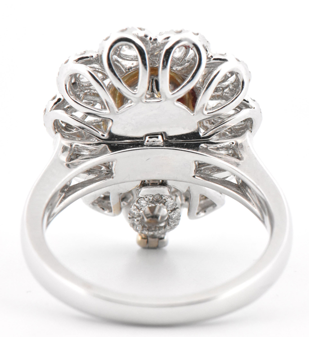 18K White Gold Diamond Ring (Converts to a Pendant) with a 1.20 Carat Pear Brilliant, SI Clarity, Fancy Yellow and 1.12 Carat Total Weight in Yellow and White Diamonds and Pear Side Diamonds
