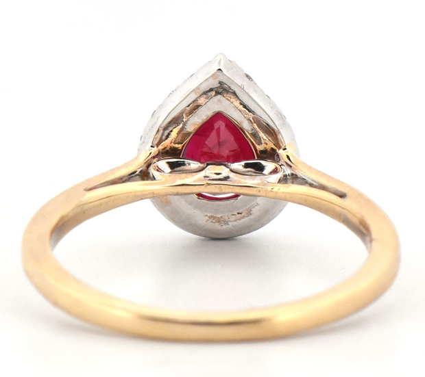 14K Two-Tone Ring with a 1.10 Carat Pear Madagascar Ruby with .17 Carat Total Weight in Round Brilliant Diamonds, SI Clarity, H Color