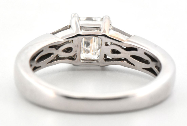 Platinum Diamond Ring with an Approximate .50 Carat Emerald Cut Diamond, VS Clarity, I Color and Approximately .30 Carat Total Weight in Baguette Side Diamonds, Vs Clarity, I Color